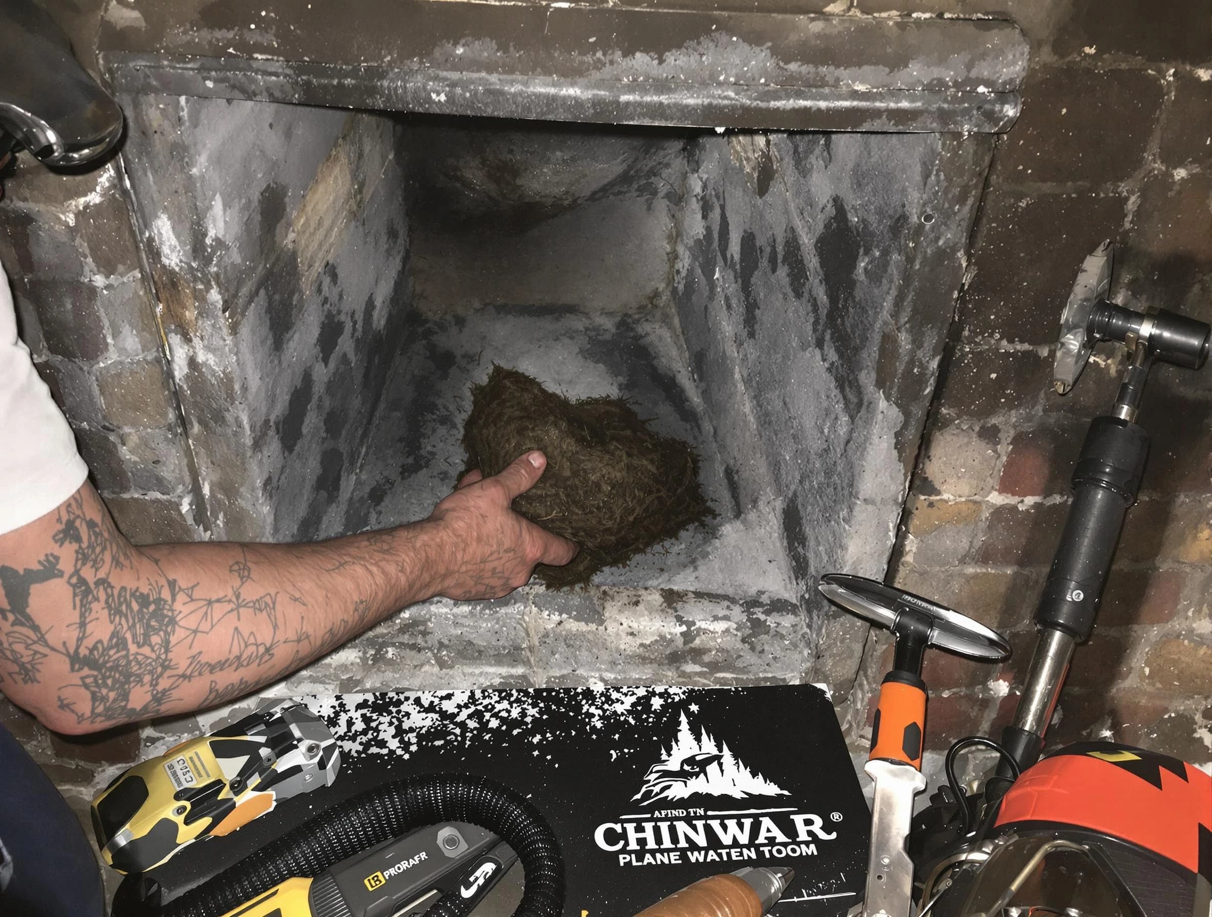 Springville Chimney Sweep safely removing debris and screening chimney in Springville, UT